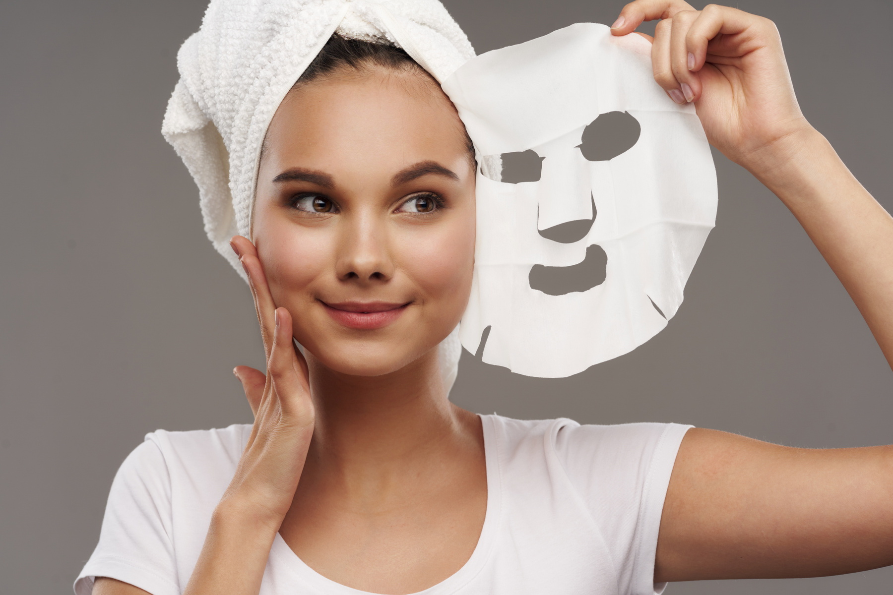 Woman with Mask on Her Face Clean Skin Care Moisturizing